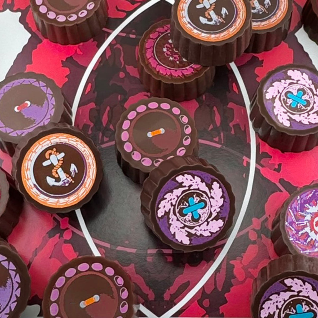 Timothy Adams Fashionable Darks chocolate truffle collection — handcrafted dark chocolate truffles made with Valrhona, presented in couture-inspired luxury gift boxes.