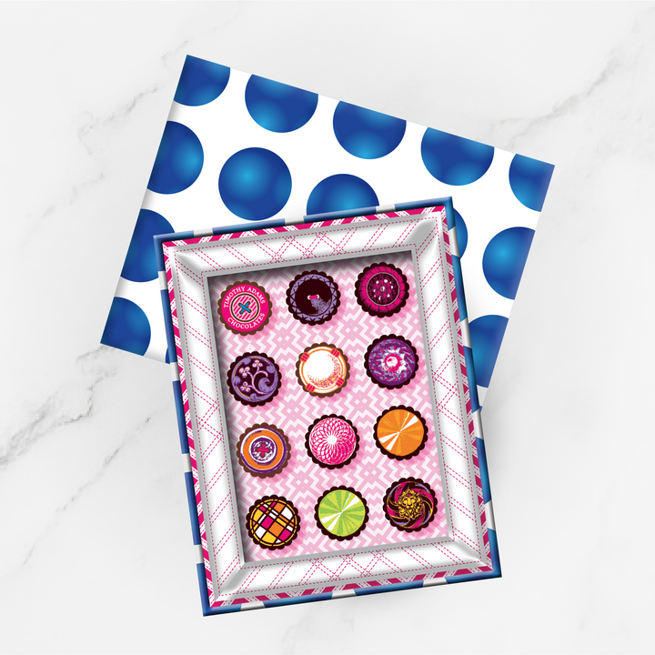 Luxury 12-piece chocolate box by Timothy Adams with assorted artisan truffles in a signature presentation