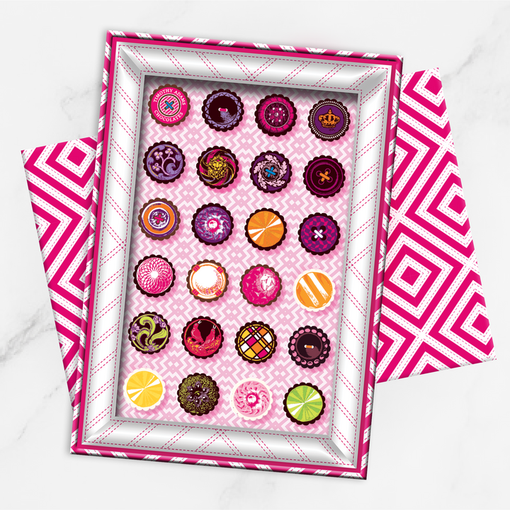 Timothy Adams Ultimate Collection of 24 handcrafted truffles in a gift box featuring flavors like raspberry, caramel, and citrus