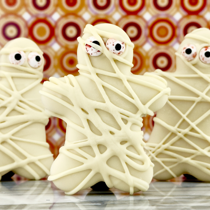 The Mummy — Ecuadorian chocolate wrapped in single-origin Blanca. Handcrafted luxury Halloween confection, in-store only.