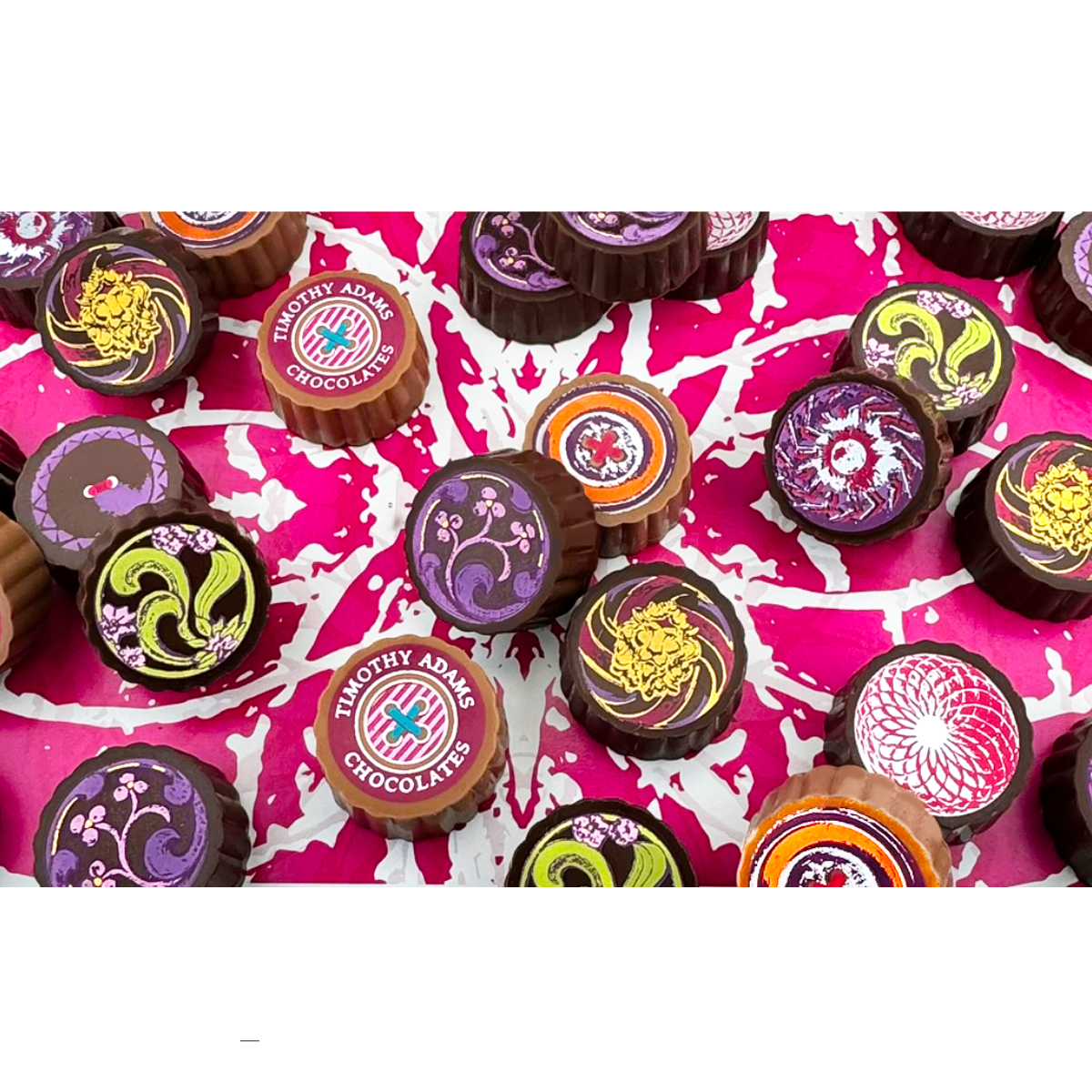 Timothy Adams Ultimate Collection luxury chocolate truffles in couture-inspired box, handcrafted with Valrhona chocolate — bestselling gourmet gift.